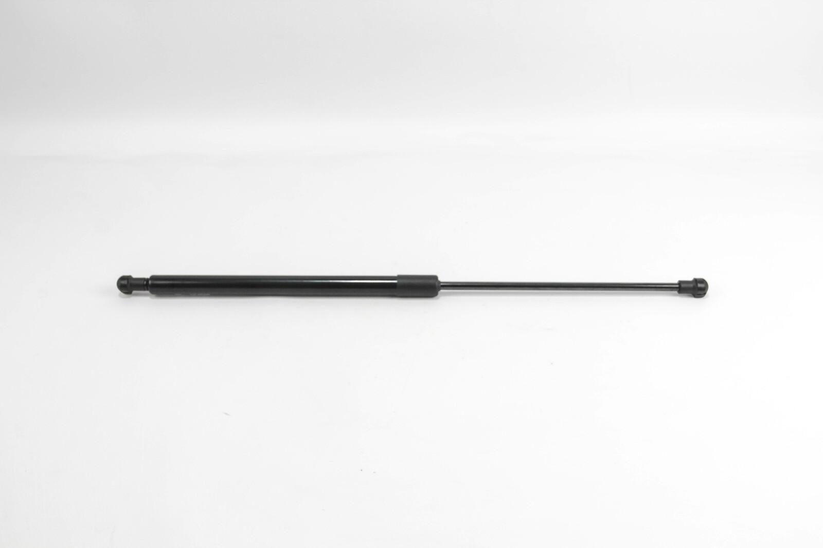 Амортизатор задньої двері Passat B3 -97 (515/210mm 500N)